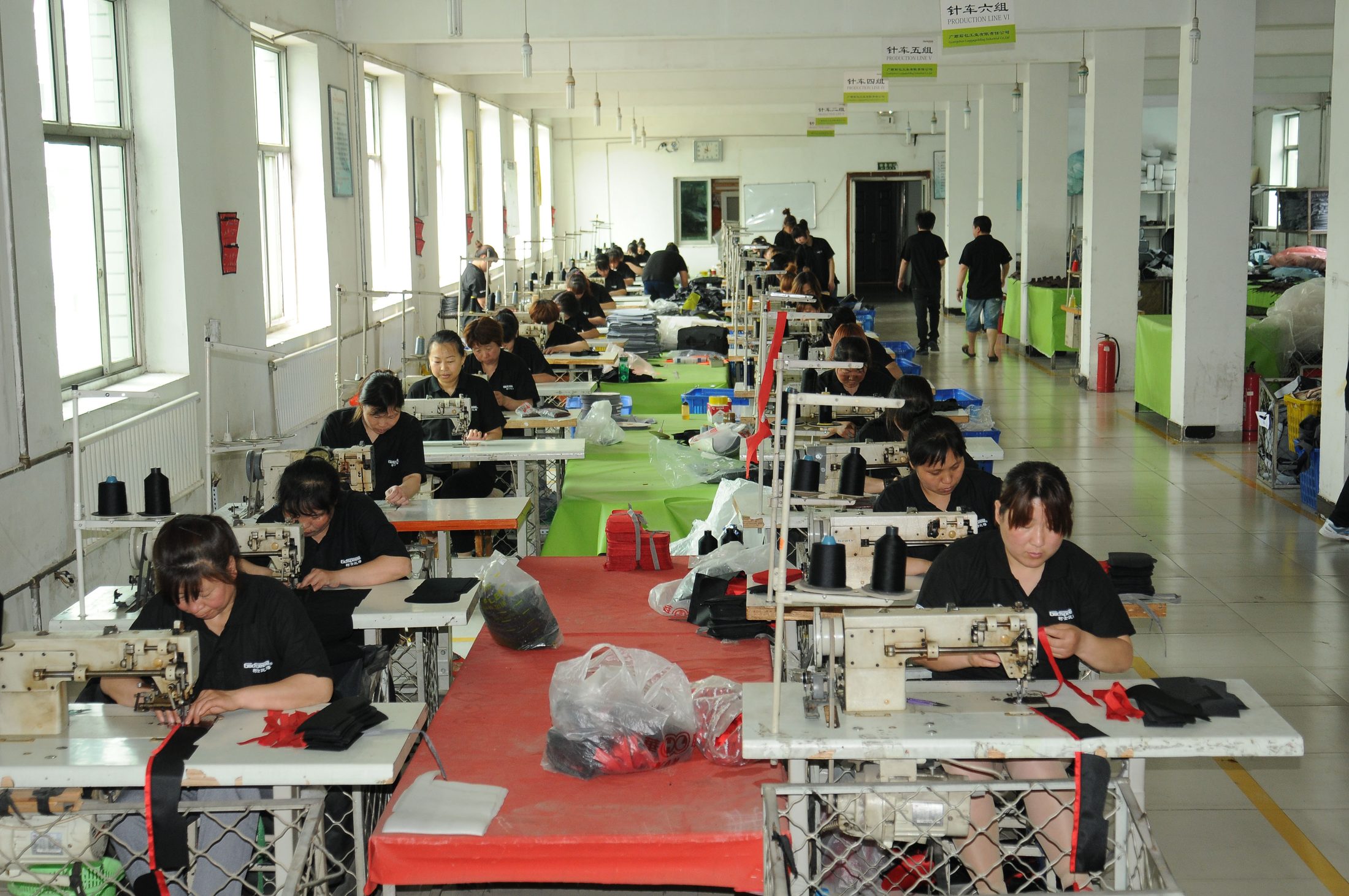 Guangshun Bags production workshop with sewing lines and in-house workers